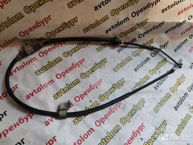 Трос ручного тормоза левый Mitsubishi Lancer 10