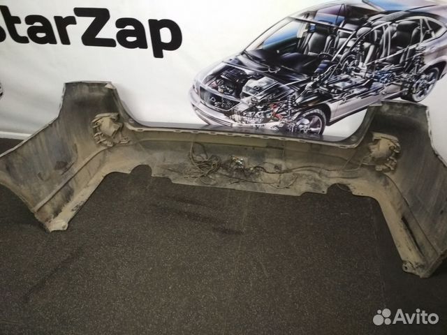 Бампер задний Субару Аутбек 57704AJ020 Бампер задний Субару Аутбек 57704AJ020