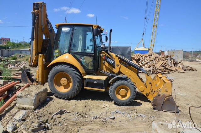 Аренда экскаватора-погрузчика CAT