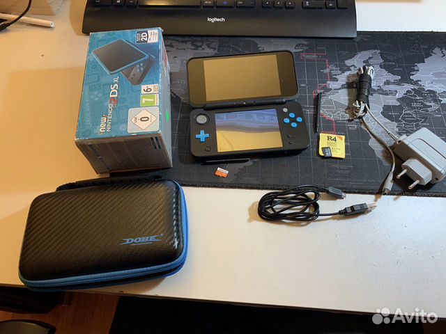 New Nintendo 2ds xl 32gb + r4 gold 16gb New Nintendo 2ds xl 32gb + r4 gold 16gb