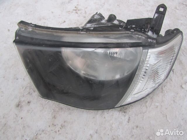 Фара передняя левая Mitsubishi L200