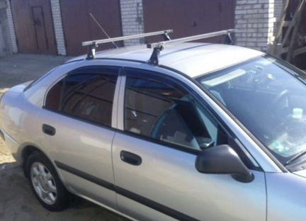 Багажник на крышу Mitsubishi Carisma