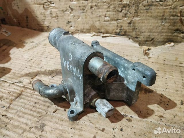 Корпус термостата Mazda 6GG 2.0