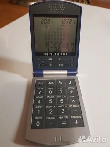 Электронный калькулятор календарь будильник часы