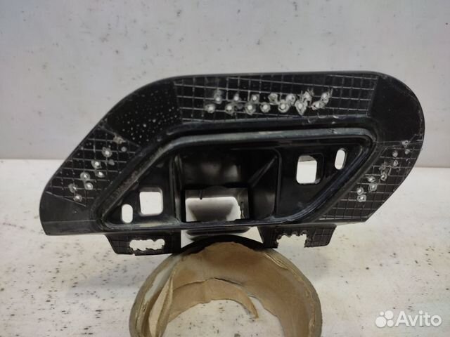 Кронштейн омывателя фар левый Volkswagen Touareg 3