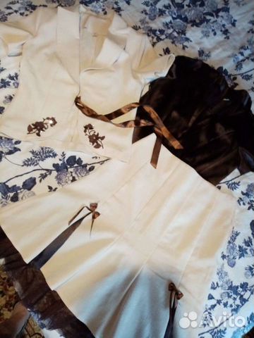 Костюмы женские