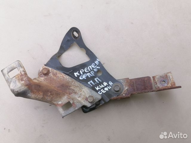 Кронштейн фары правый Kia Sephia 1993-1997