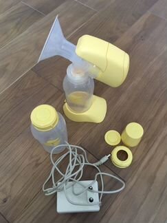 Молокоотсос Medela mini electric и Medela Calma
