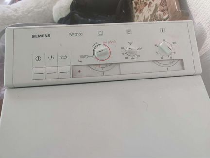 Стиральная машина с вертикальной загрузкой Siemens