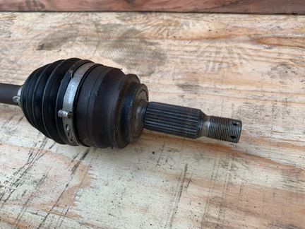 Приводной вал левый Mitsubishi Lancer 10 2.0