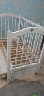 Детская кровать с маятником и ящиком