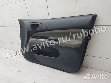Обшивка двери передняя правая Mitsubishi Lancer 9